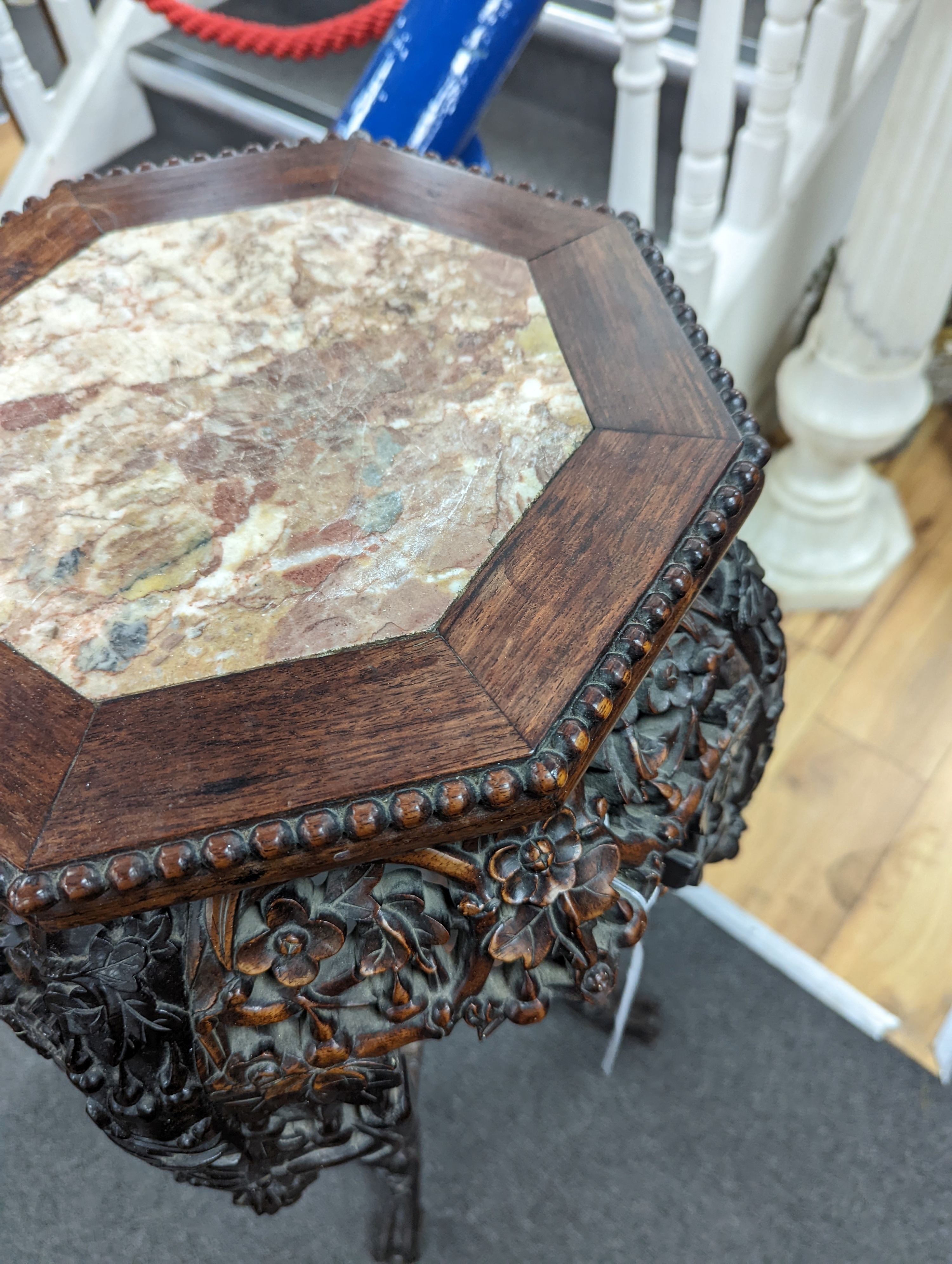 A Chinese hongmu marble topped jardiniere stand, early 20th century, height 90cm